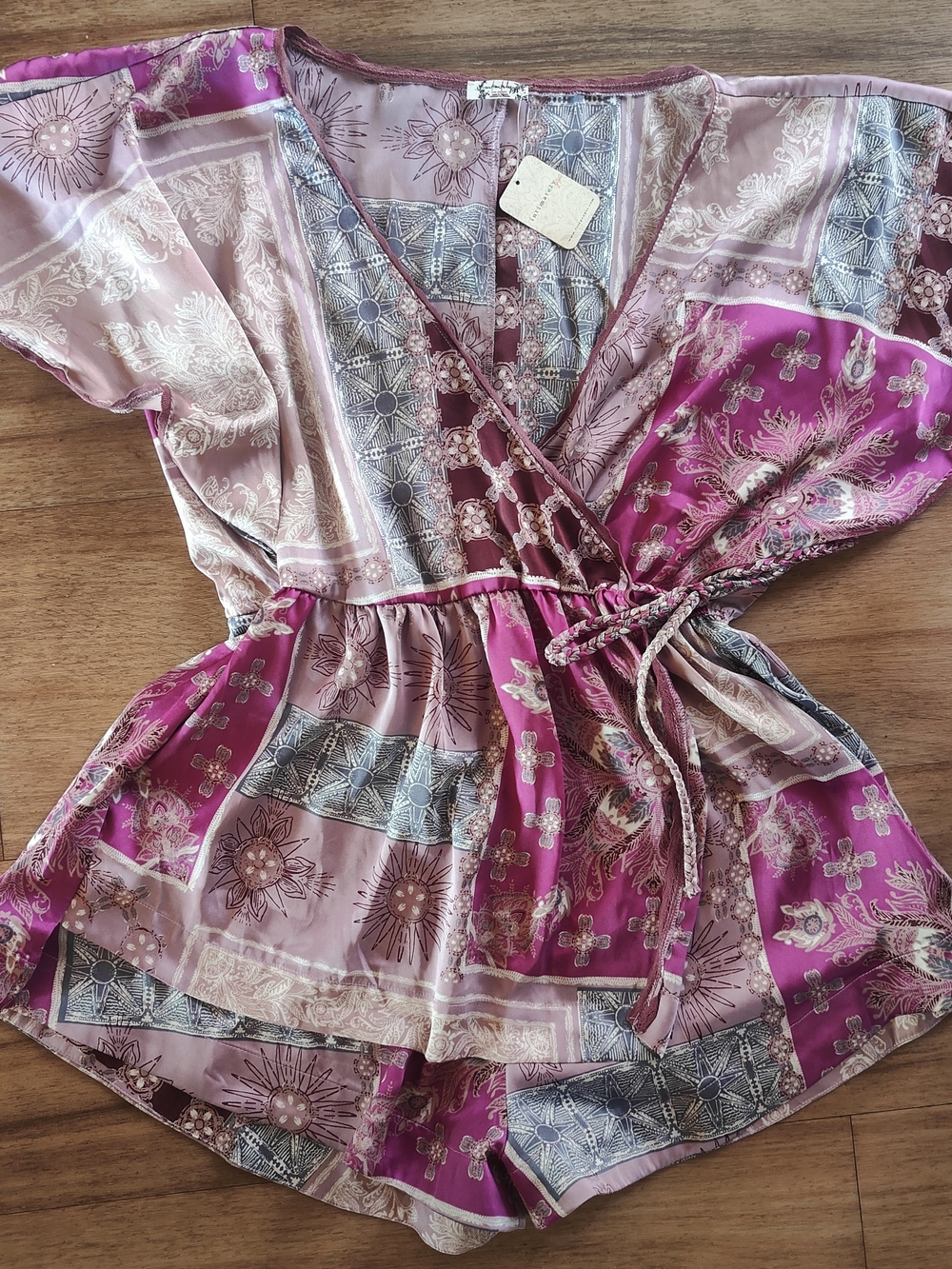 NWT Free People "Oasis" Pink Patchwork Wrap Romper. Size Small